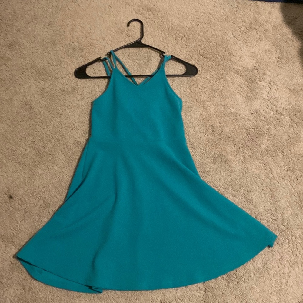 I am selling a teal fancy, dinner dress.